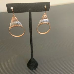 Hammered copper and silver earrings.
